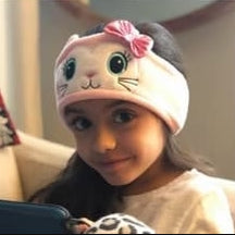 A child wearing CozyPhones