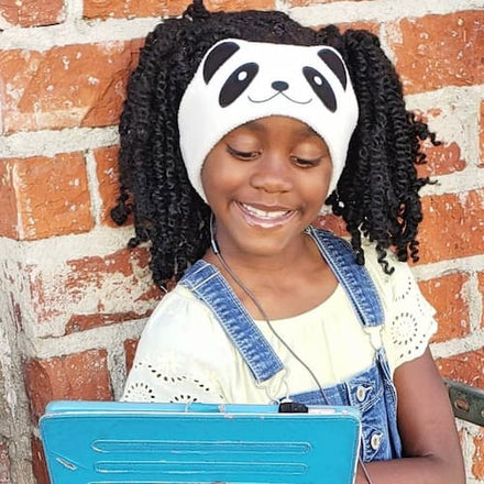 A child wearing CozyPhones